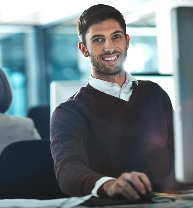 ttc-business-man-sitting-at-sales-desk-ready-to-assist